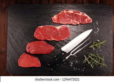 Steak raw. Barbecue Rib Eye Steak, dry Aged Wagyu Entrecote. Variety of Raw Black Angus Prime meat steaks Machete, Striploin, Rib eye, Tenderloin fillet mignon