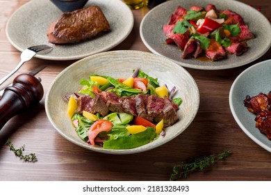 Steak Salad With Beef, Sliced Roastbeef And Steak From Beef On Plate Side View