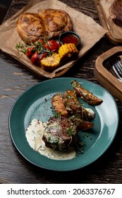 Steakhouse Menu, Assortment Of Meat Meals On Dark Wooden Table