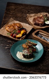 Steakhouse Menu, Assortment Of Meat Meals On Dark Wooden Table