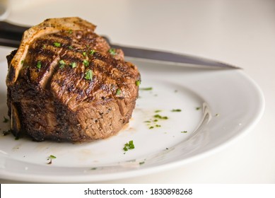 Steaks. Grade A Grass Fed Angus Beef Steaks. Tenderloin, Filet Mignon, New York Strip, Bone In Rib-eye Grilled To Perfect Medium Rare On Outdoor Wood-fired Grill. Classic American Steakhouse Entree.