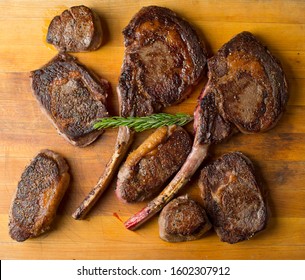 Steaks. Traditional Classic Texas/New York Steakhouse Menu Items: Cuts Of A Variety Of Pieces Of Steaks And Meats. Filet Mignon. Tbone, Bone In Ribeye. NY Strip. Tomahawk. Seared On The Grill.