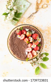 Steam Cooked Cake Decorating With Daisies, Strawberry And Chocolate Sauce.