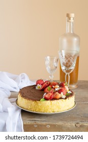 Steam Cooked Cake Decorating With Daisies, Strawberry And Chocolate Sauce.