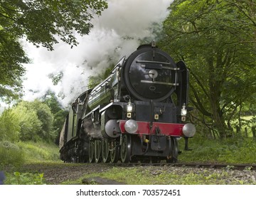 Steam Engine Pulling A Train Up A Steep Cornish Incline, England, UK.