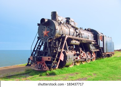 Steam Machine On Train Station. Shore Of Lake Baikal (Russia)