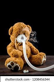 Steam Mist From Nebulizer Or Nebuliser Electrical Machine Drug Delivery Device Used To Administer Medication In The Form Of A Mist Inhaled Into The Lungs Concept. Toy Teddy Bear With Face Mask.