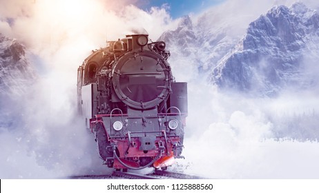 steam powered locomotive dashing through scenic mountains - Powered by Shutterstock
