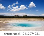 Steam rising from various geysers in the Upper Geyser Basin in Yellowstone National Park, USA