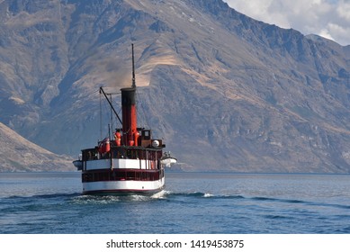 Steam Ship Cruising Across The Lake In Queenstown NZ