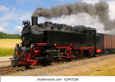 Steam Train With Black Smoke; Island Rugen, Northern Germany