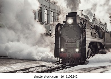 Steam Train Departs From Railway Station. Moscow. Russia.