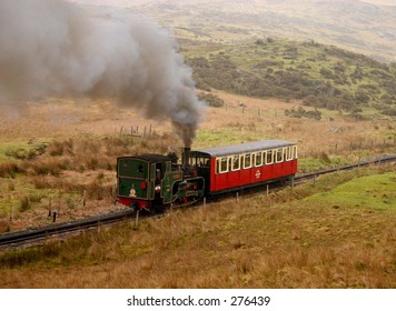 Steam Train On The Snowdon Mountain Railway During A Wet Day