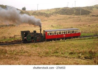 Steam Train On The Snowdon Mountain Railway During A Wet Day