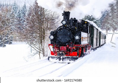 Steam train ride in winter snow travel scene