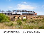 Steam Train Travelling over an Old Bluestone Bridge, Sunbury, Victoria, Australia, October 2018