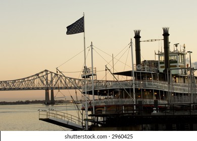 Steamboat On Mississippi River In New Orleans At Sunset Time