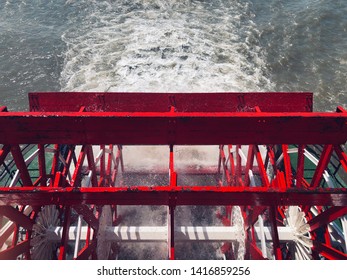 Steamboat Wheel Pushing Through Water