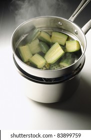 Steam-cooking the zucchinis