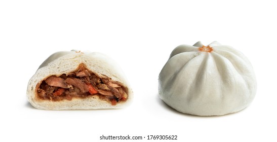 Steamed  bao buns with delicious filling isolated on white 
