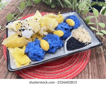 Steamed blue sticky rice with Wild yam mixed sesame seed - Powered by Shutterstock