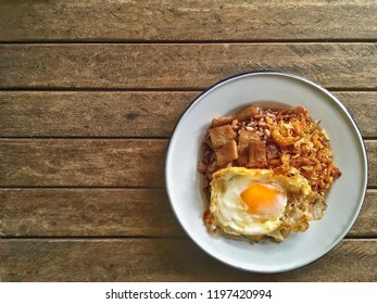 Steamed Brown Rice Eat With Chilli Paste,  Sun-dried Pork And Fried Egg Served On The Zinc Plate Is Simple Delicious Thai Local Food.