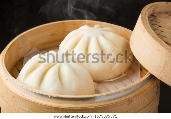 manjū (steamed bun) with\
meat filling