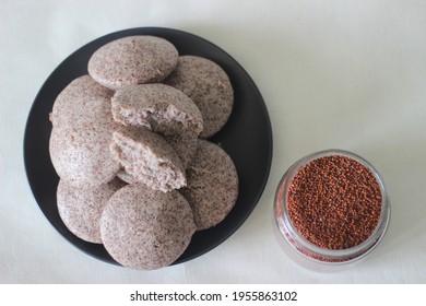 Steamed Cakes Made With Finger Millets And Skinned Black Gram. Locally Known As Ragi Idli. Shot On White Background.