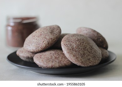 Steamed Cakes Made With Finger Millets And Skinned Black Gram. Locally Known As Ragi Idli. Shot On White Background.