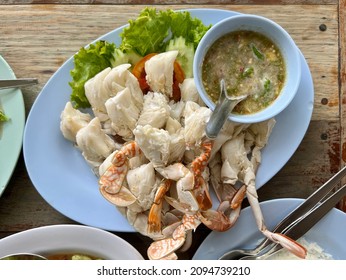 Steamed Crab Legs Served With Seafood Spicy Sauce