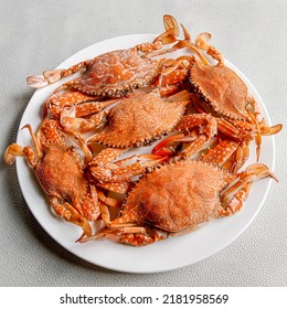 Steamed Crabs On A White Plate. Cooked Blue Crabs.