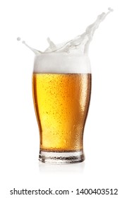 Steamed Glass Of Light Beer With Splash Isolated On White Background