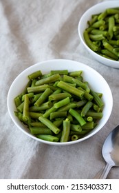 Steamed Green Beans In A White Bowl, Side View. 