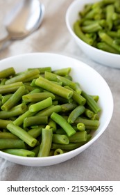 Steamed Green Beans In A White Bowl, Side View. 