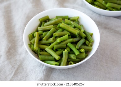 Steamed Green Beans In A White Bowl, Side View. 