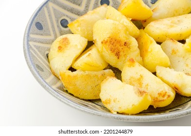 Sautéed Steamed Potatoes On A Plate