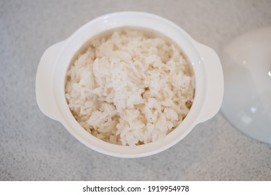 Steamed Rice In White Bowl On Table. Top View