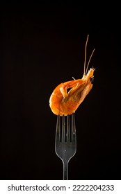 Steamed  Shrimp Steam On Fork Isolated Black Background Copy Space. Isolated Black Background Backlight  Backlit Food Concept Ready To Eat