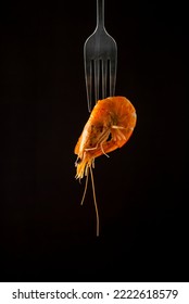 Steamed  Shrimp Steam On Fork Isolated Black Background Copy Space. Isolated Black Background Backlight  Backlit Food Concept Ready To Eat