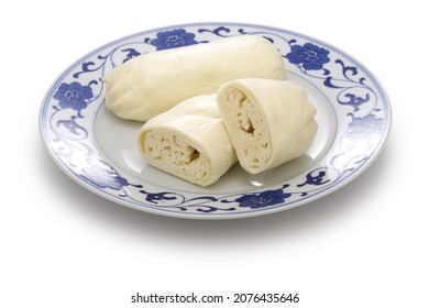 steamed silver thread roll;silver thread roll is a type of chinese bun; steamed bun from shandong province bun with hand-drawn dough threads folded over.