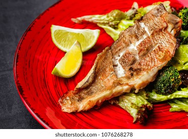 Steamed Snapper (pacific Ocean Perch, Sea Bass, Ruby Perch) With Soy Sauce, Lemon, Ginger And Parsley In Asian Style. Healthy Cooking