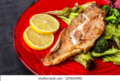 Steamed Snapper (pacific Ocean Perch, Sea Bass, Ruby Perch) With Soy Sauce, Lemon, Ginger And Parsley In Asian Style. Healthy Cooking