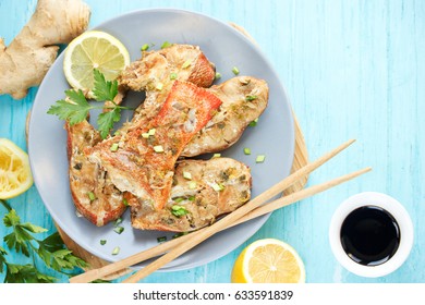 Steamed Snapper (pacific Ocean Perch, Sea Bass, Ruby Perch) With Soy Sauce, Lemon, Ginger And Parsley In Asian Style. Healthy Cooking