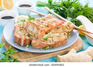 Steamed Snapper (pacific Ocean Perch, Sea Bass, Ruby Perch) With Soy Sauce, Lemon, Ginger And Parsley In Asian Style. Healthy Cooking