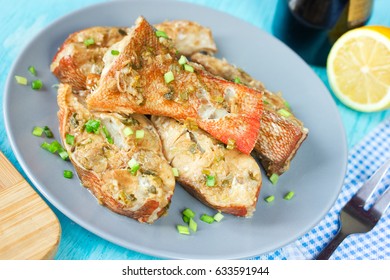 Steamed Snapper (pacific Ocean Perch, Sea Bass, Ruby Perch) With Soy Sauce, Lemon, Ginger And Parsley In Asian Style. Healthy Cooking