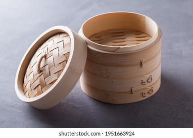Steamer set made of bamboo on grey background - Close up