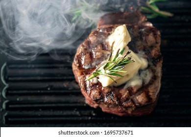 A Steaming Beef Tenderloin Steak Is Grilled In A Grill Pan With The Text Copy Space. The Concept Of The Recipe , Filet Mignon