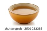 A steaming bowl of savory nourishing homemade soup made with fresh ingredients served in a simple ceramic bowl against a plain white background creating a minimalist and elegant composition 