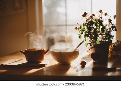 Steaming bowls of oatmeal in the early morning - Powered by Shutterstock