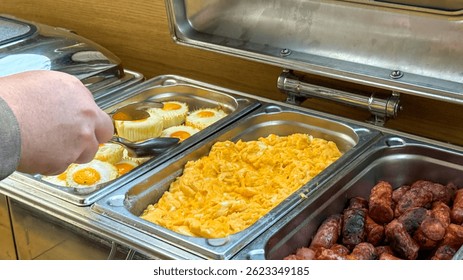 A steaming buffet of scrambled eggs, breakfast sausage odyssey, Renaissance Feast, Scottish Hogmanay, mysterious culinary symphony